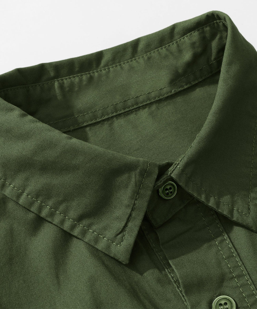 Man looking relaxed in a Men's Premium Cotton Terrain Trek Shirt, showcasing its comfort and style.