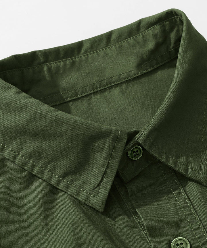 Man looking relaxed in a Men's Premium Cotton Terrain Trek Shirt, showcasing its comfort and style.