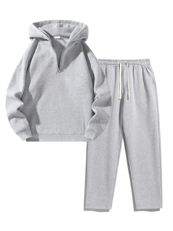 Front view of men's fleece half-zip hoodie and joggers, a cozy loungewear set for ultimate comfort and style.