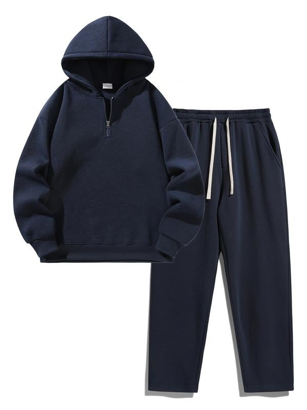 Men's athletic-fit fleece half-zip hoodie and matching joggers, a complete men's activewear set for all-day comfort.