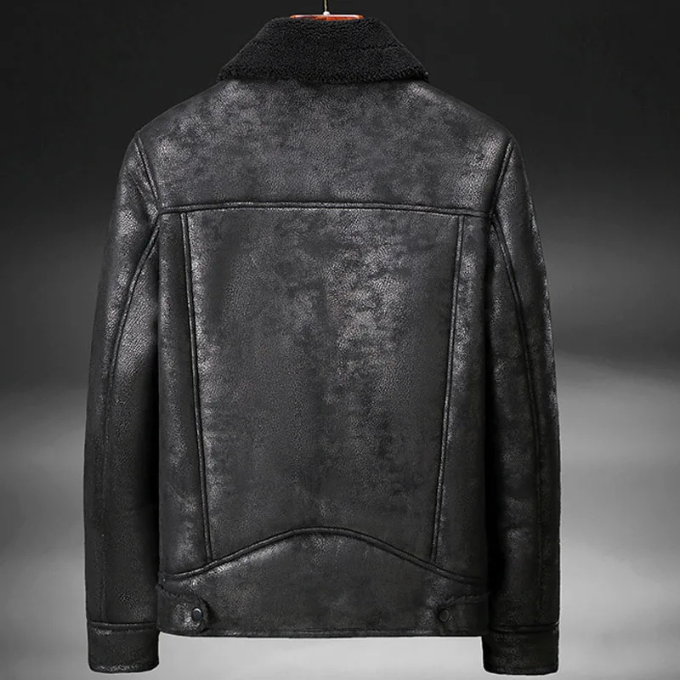 Detailed shot of cuff and hem on men's premium leather jacket, ensuring snug fit and warmth