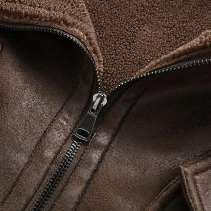Side view of men's leather aviator jacket, featuring sturdy zipper and pocket design, outerwear essential