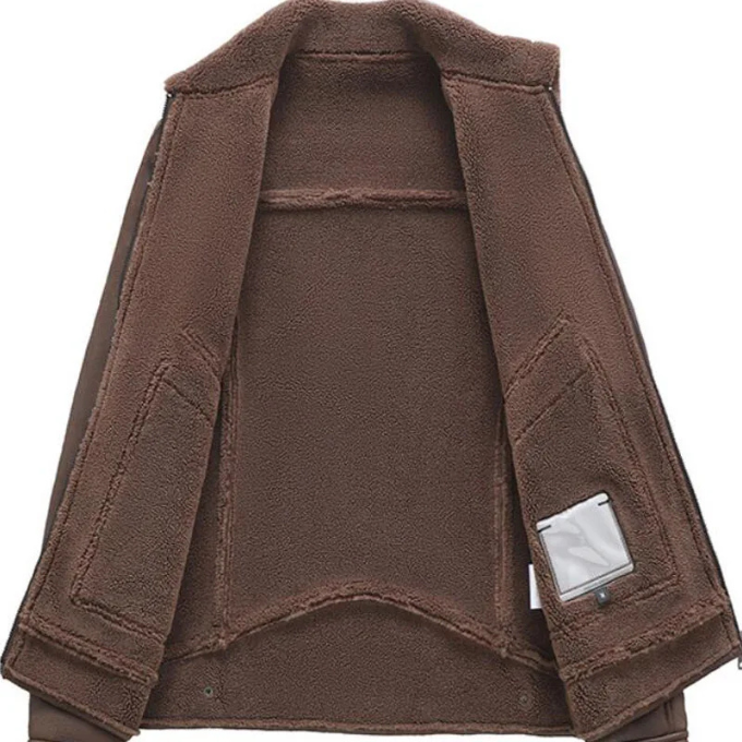 Inside view of men's insulated leather jacket, showing soft lining and quality finishing
