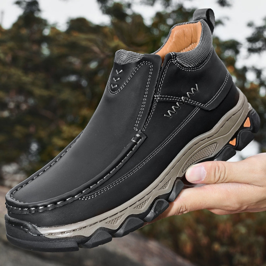 Front view of men's comfort slip-on shoes in black leather, wide fit for walking, orthopedic support