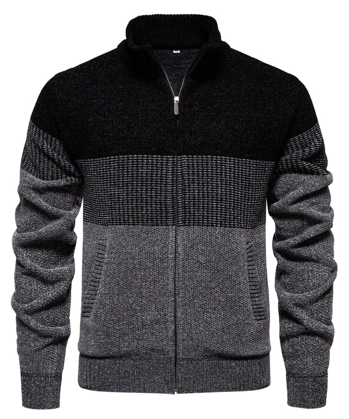 Close-up of men's color block long sleeve sweater, highlighting knit texture & charcoal tones