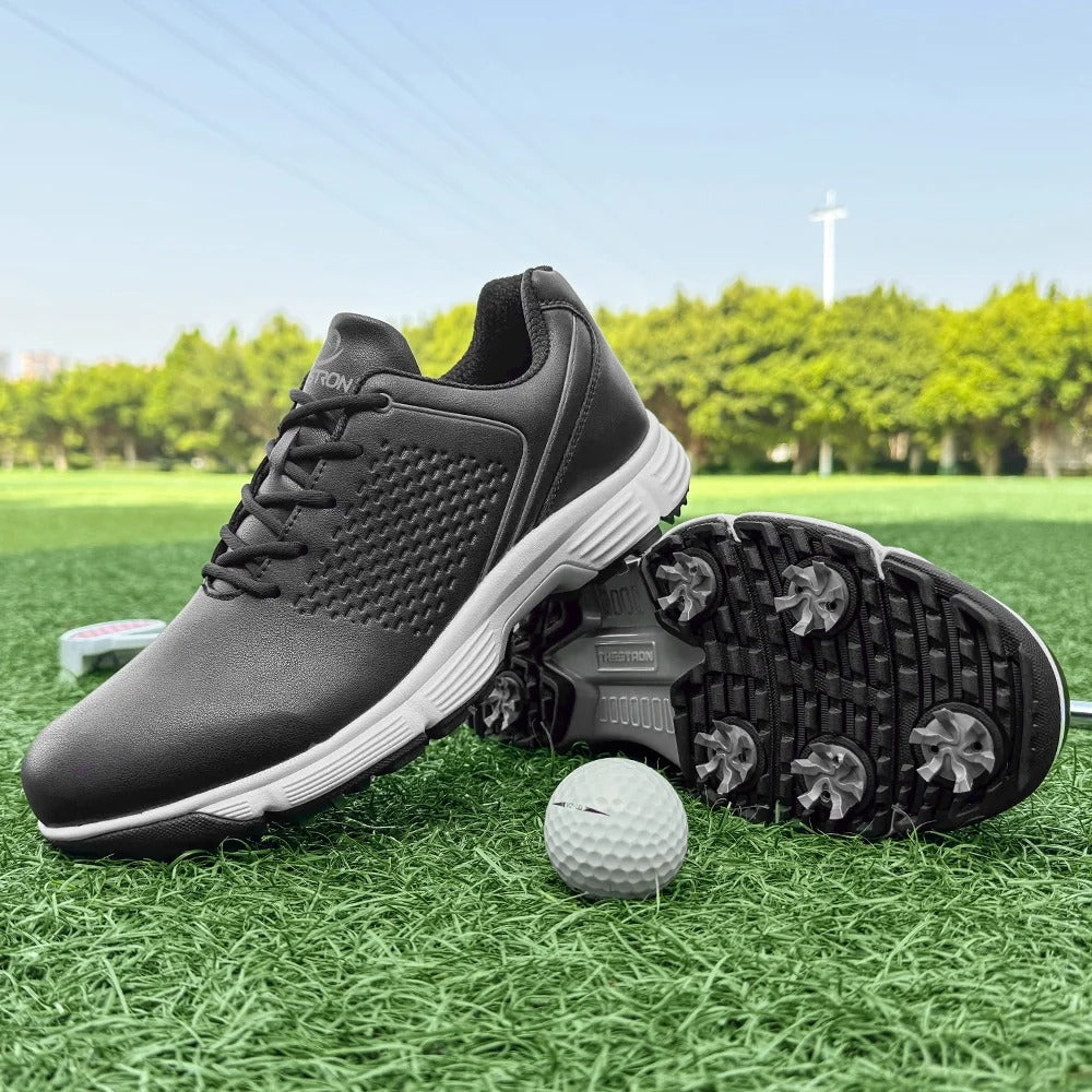 Blackout men's spiked golf shoes, crafted from premium leather for durability and style.