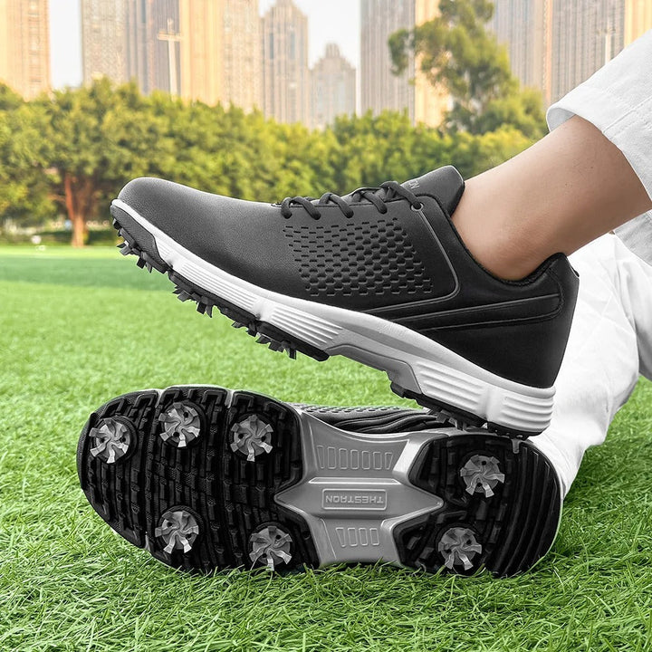 Athletic men's golf shoes with performance spikes, designed for comfort on the course.