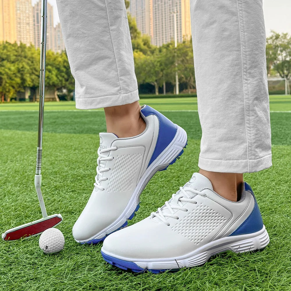 Pro-grade men's spiked golf shoes in blackout, ideal for serious golfers.