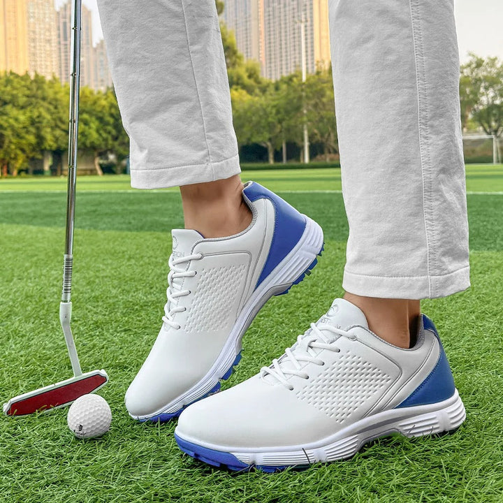Pro-grade men's spiked golf shoes in blackout, ideal for serious golfers.