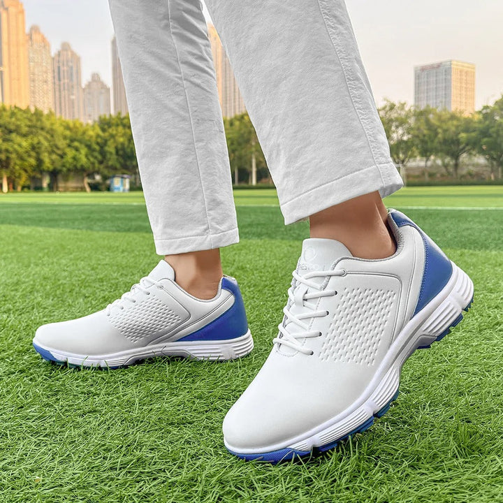 Men's golf shoes, blackout, with advanced spike technology for ultimate grip.