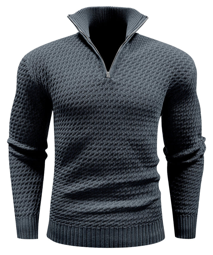 Detail of the quarter-zip on a men's long-sleeve turtleneck pullover sweatshirt