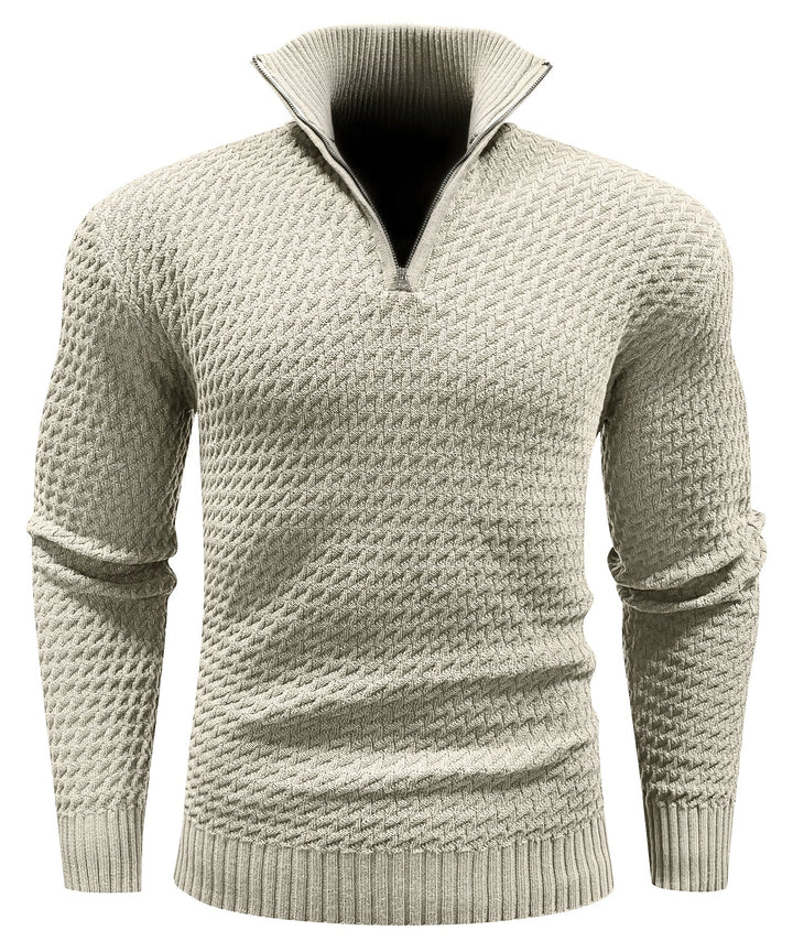 Side view of a man wearing a blue quarter-zip turtleneck pullover, casual look