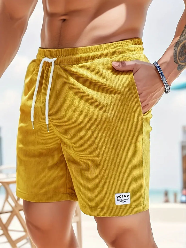 Athletic men's quick-dry pool shorts, ideal for active beach days or casual summer fashion.