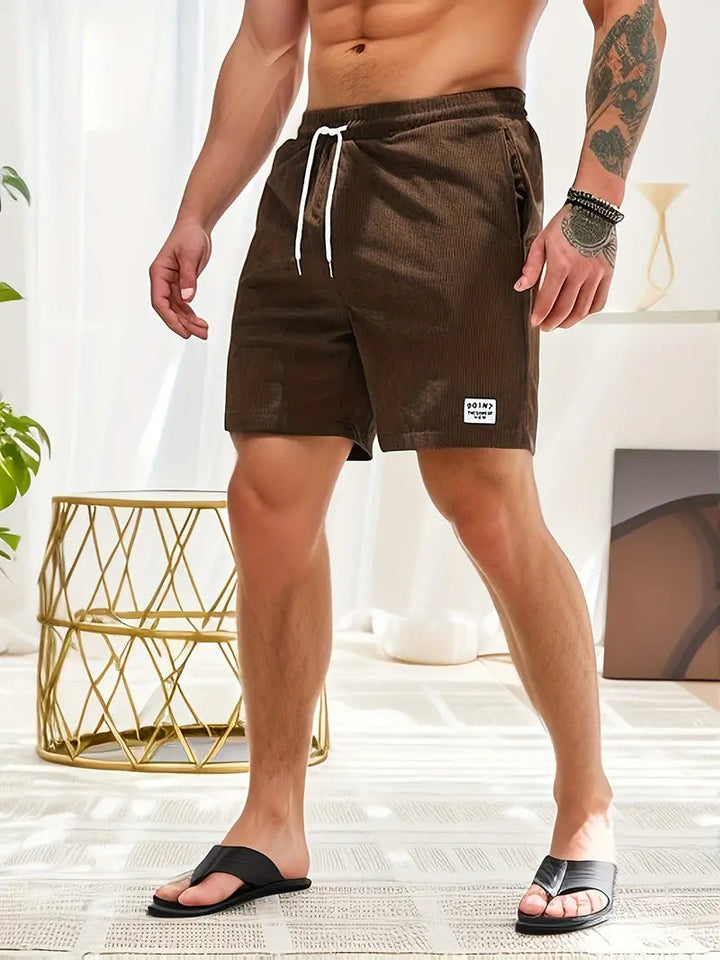Lightweight men's quick-dry board shorts, essential summer beachwear for men.