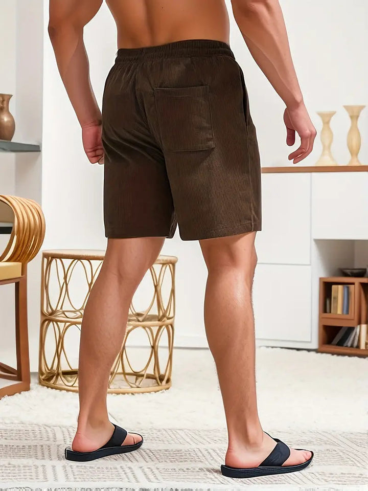 Vibrant men's quick-dry swim shorts, perfect for pool parties & beach vacation.