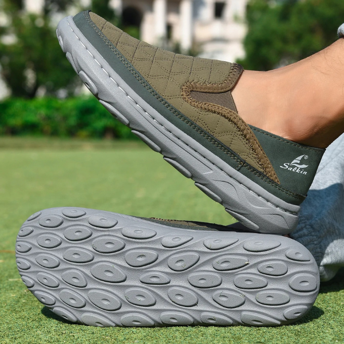 Black men's comfort shoes, slip-on style with a soft quilted finish