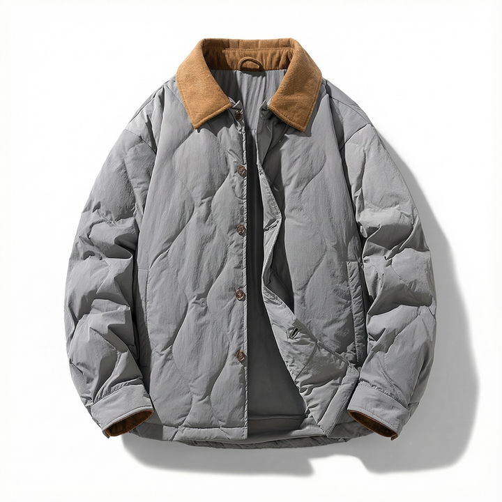 Lifestyle shot: Men's quilted cotton jacket with corduroy collar, offering a blend of comfort and rugged style