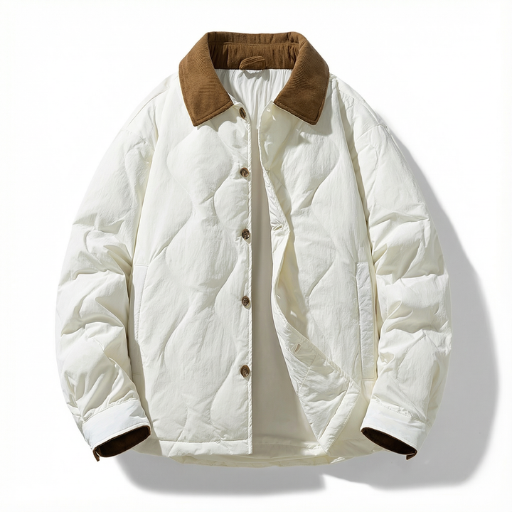 Image of a man wearing a smart quilted cotton jacket with a corduroy collar, styled for casual outings
