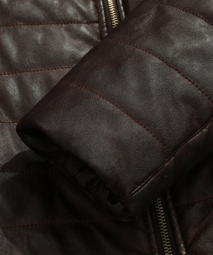 Close-up of the sleeve cuff on the men's brown quilted faux leather jacket