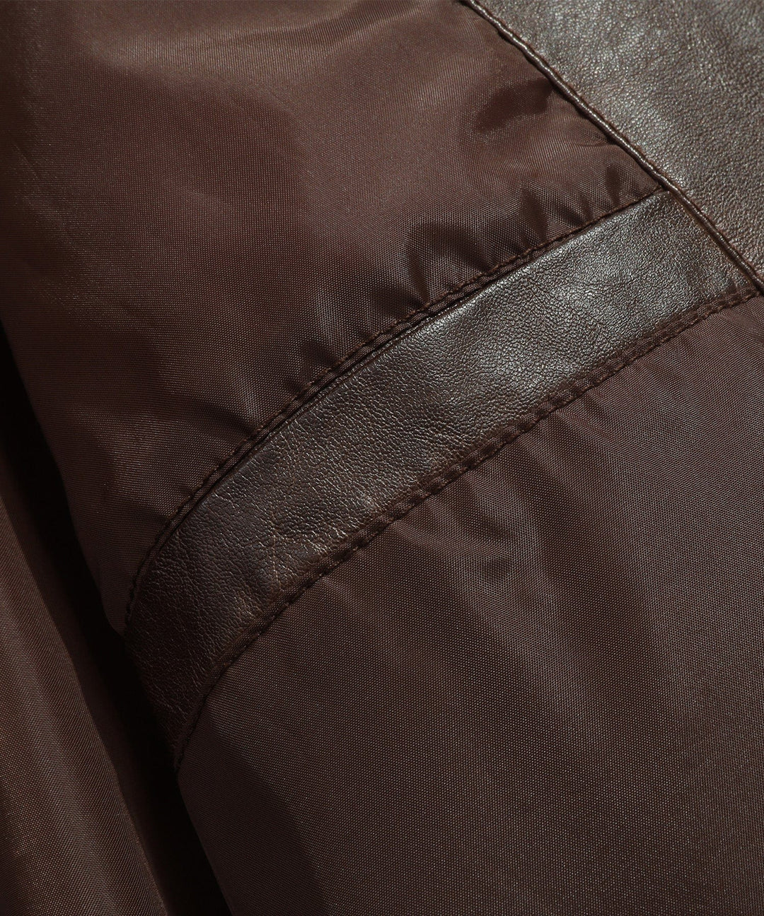 Brown men's jacket with quilted detailing, a fashionable and warm outerwear option