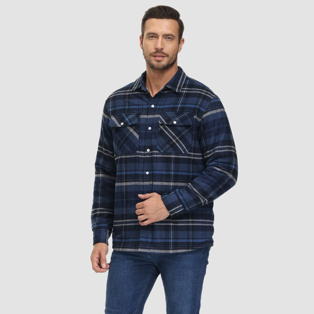 Detail of the cuff with button closure on a men's plaid flannel fleece lined jacket, quality casual wear