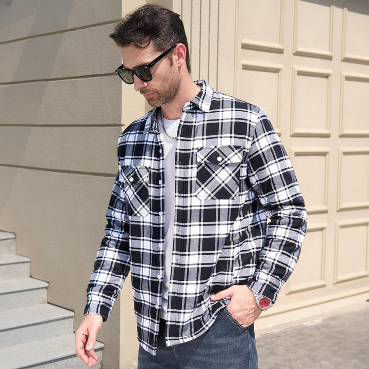 Front view of the buttons on a men's warm flannel fleece lined jacket, secure and stylish closure