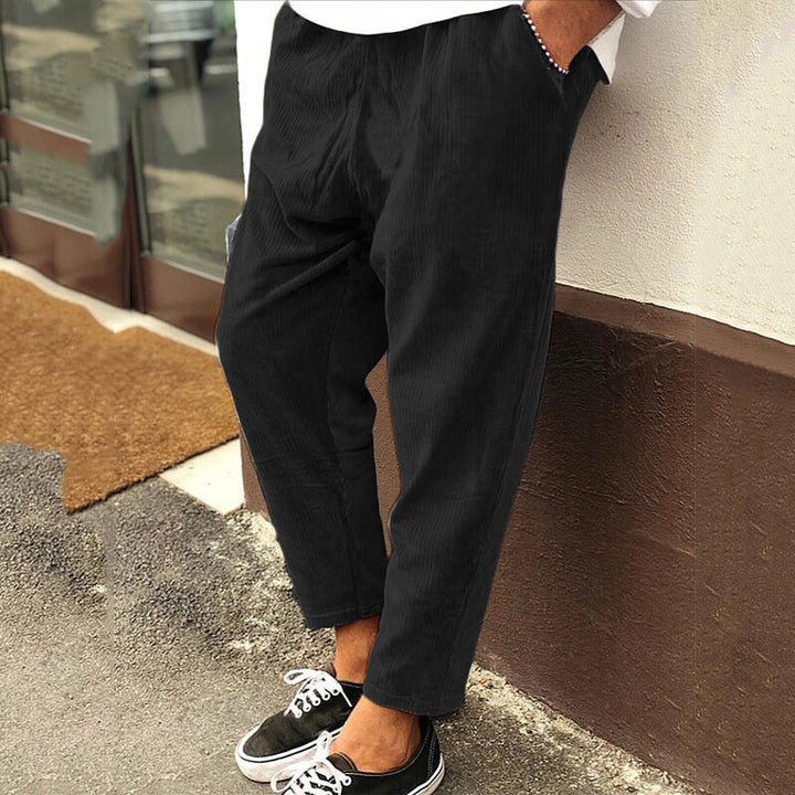 Brown corduroy relaxed fit trousers for men, comfortable and versatile fashion wear