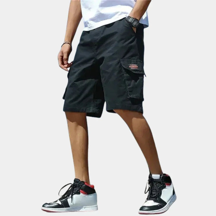 Durable men's cargo shorts with a relaxed fit, designed for ultimate comfort during summer hikes and outdoor adventures.