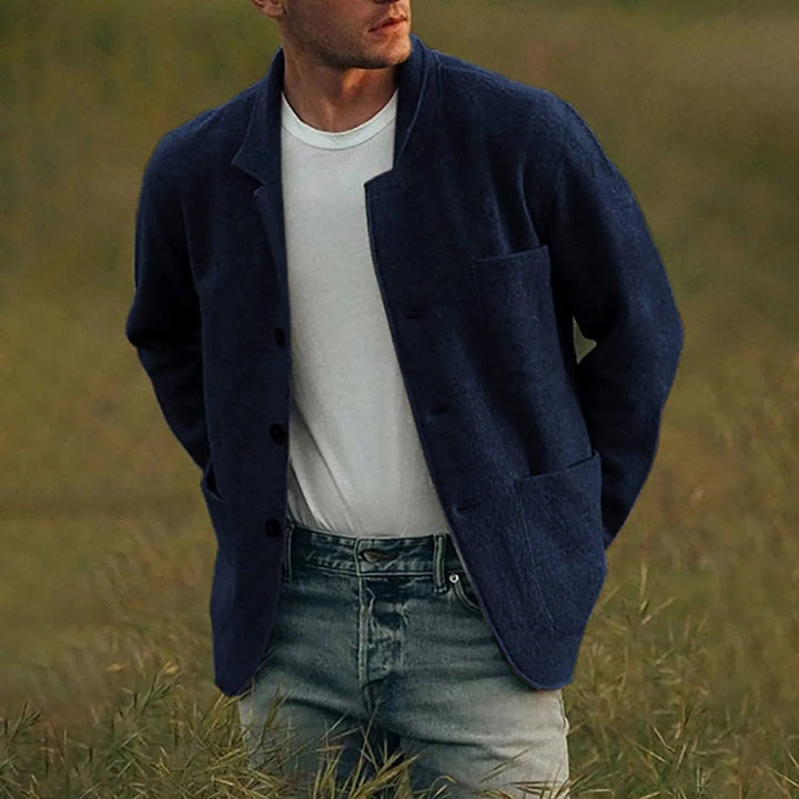 Relaxed fit men's blazer in a classic color, designed for casual comfort & a sharp smart casual aesthetic. A versatile jacket.