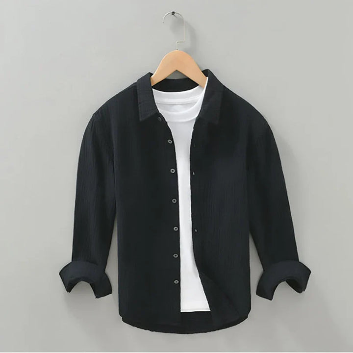 Breathable long sleeve men's cotton shirt, relaxed fit, in white for versatile styling.