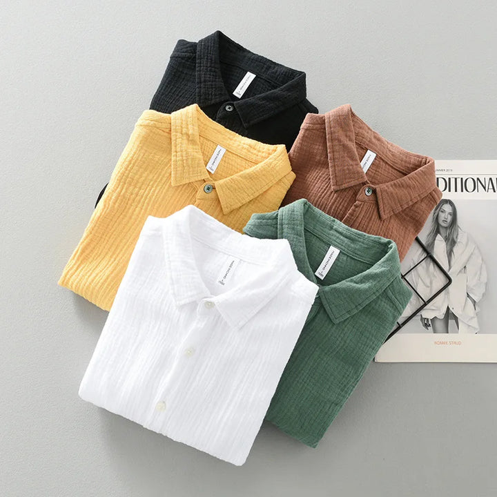 Men's relaxed fit long sleeve cotton shirt in a neutral beige, suitable for various occasions.