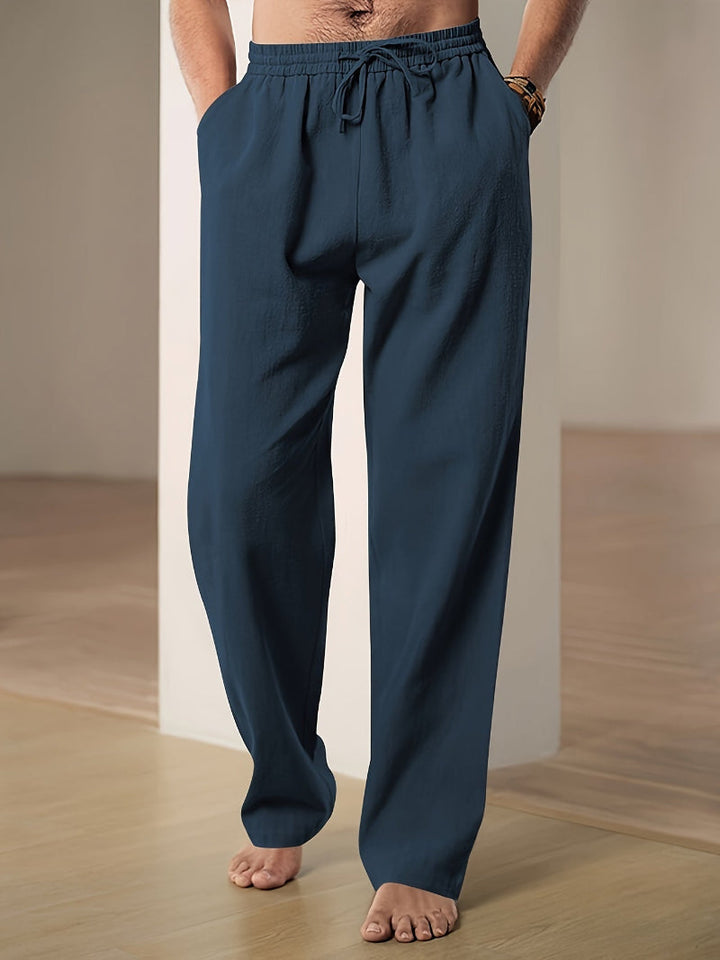 Versatile men's relaxed fit drawstring pants, perfect for travel, casual wear, or everyday activities.