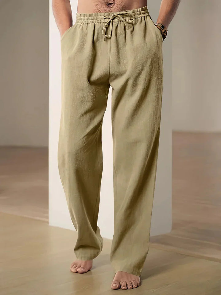 Everyday comfort men's drawstring pants; relaxed fit design with practical pockets and adjustable waist.