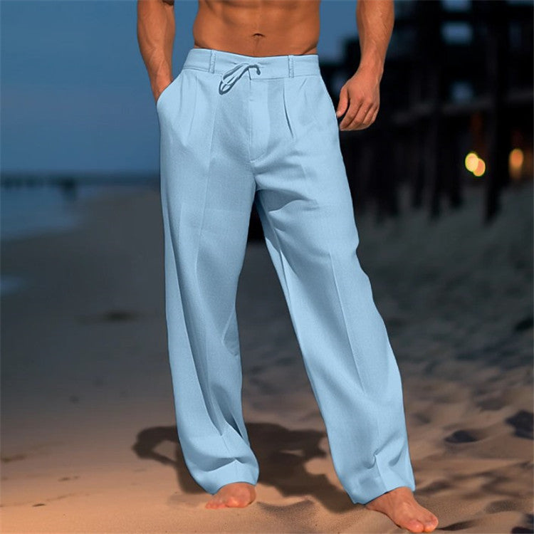 Stack of folded men's relaxed fit drawstring pants in various spring colors, comfortable and stylish