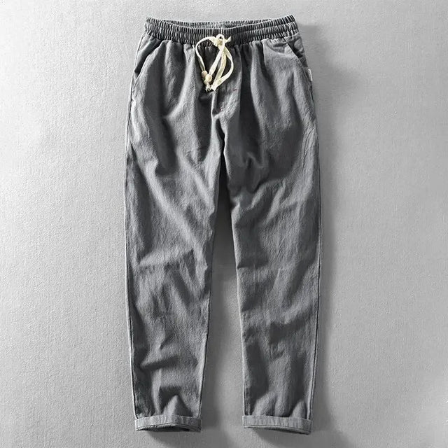 Comfortable men's linen jogger pants, relaxed fit with tapered leg and adjustable drawstring for summer wear