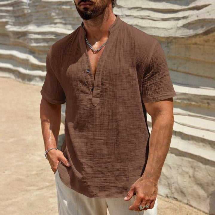 Short sleeve men's polo top, relaxed fit, textured cotton blend fabric for casual wear