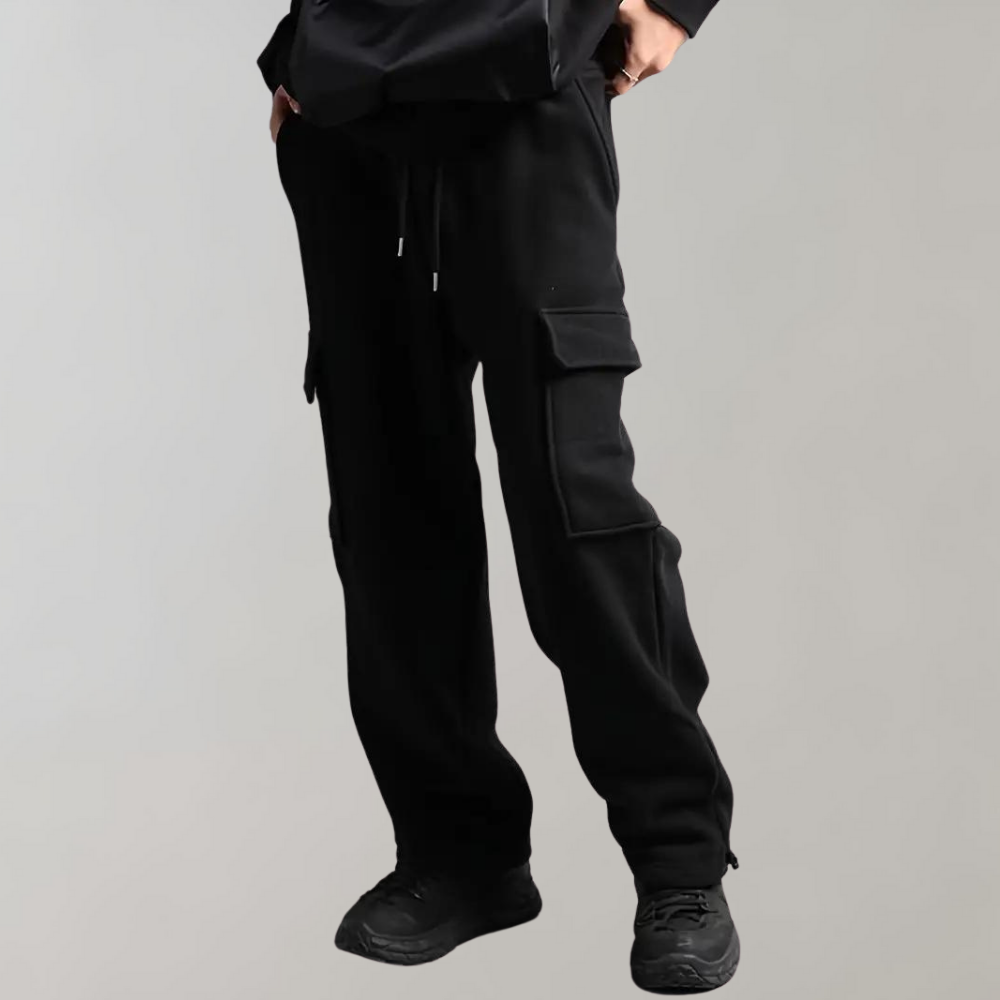 Side view of grey men's relaxed fit tactical cargo pants, showing a spacious and practical design.