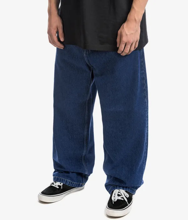 Casual men's wide leg jeans, paired with a t-shirt, embracing spring fashion and comfort