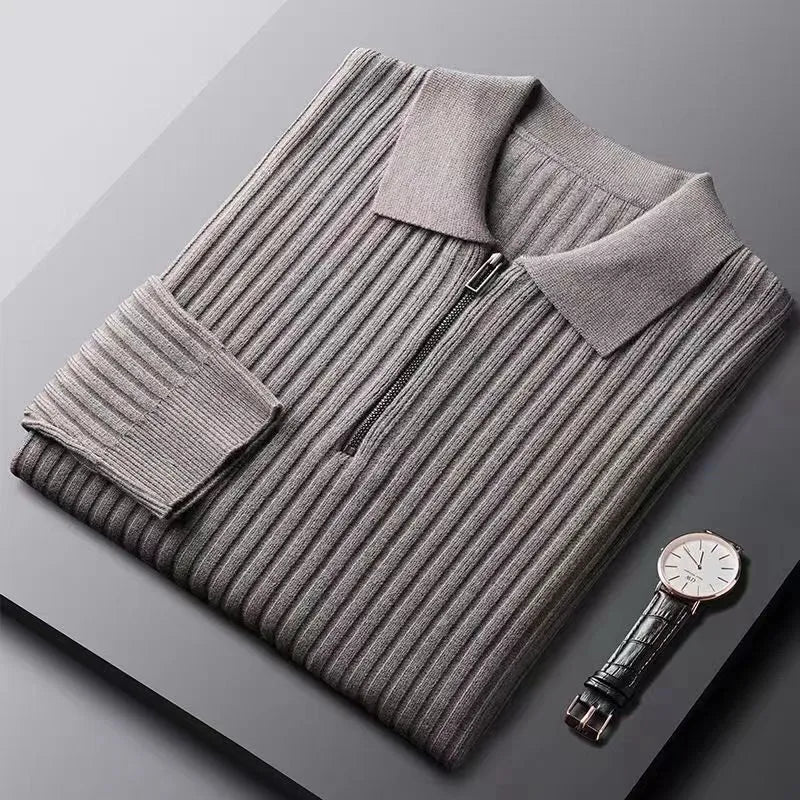 Detail of the ribbed texture and zip neck feature on a men's winter fashion sweater.