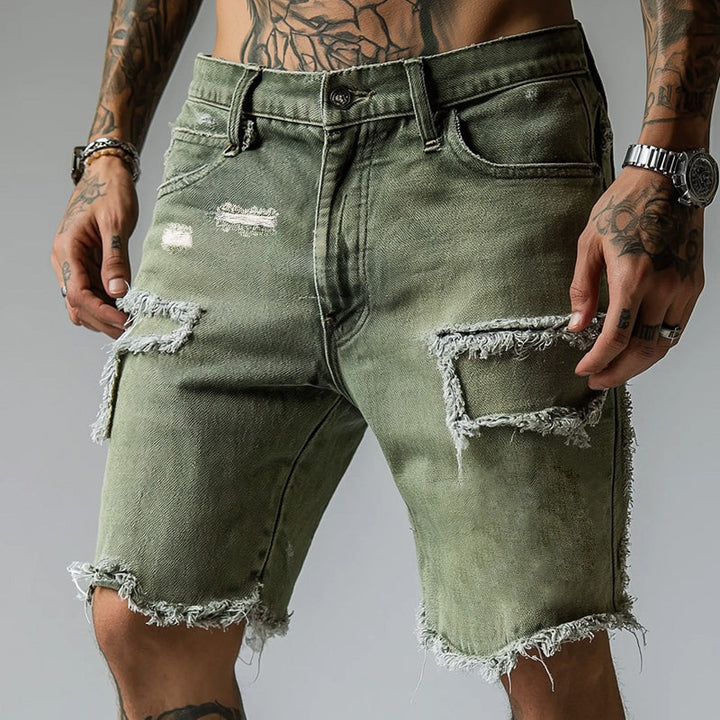 Trendy men's green ripped stretch denim shorts, relaxed fit for summer fashion and casual wear.