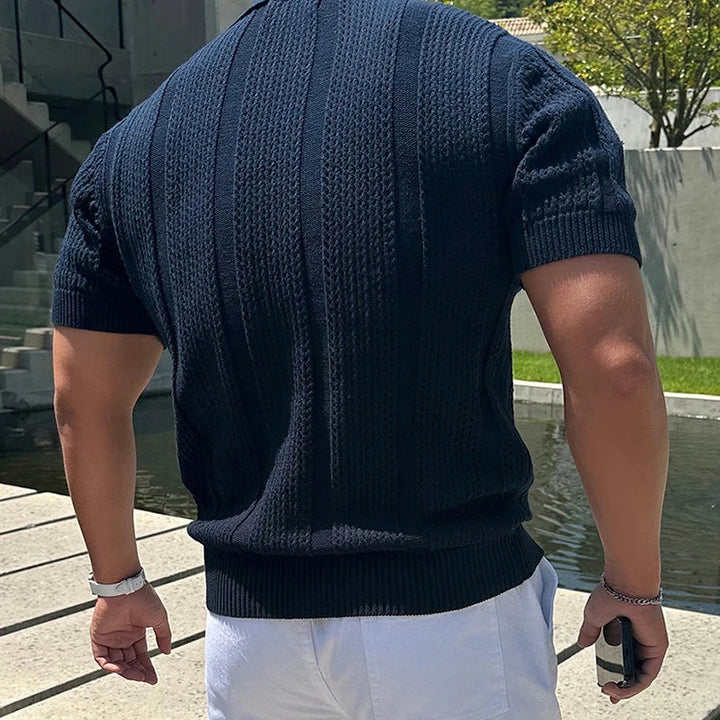 Close-up of the breathable knit fabric on a Men's Riviera polo shirt, highlighting its texture