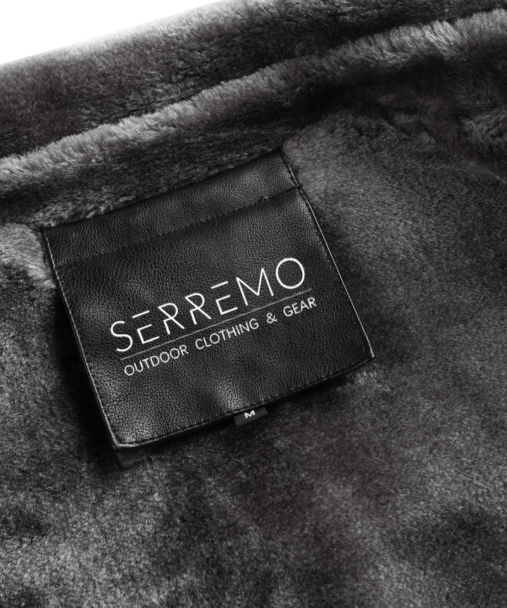Interior view of the insulated lining within the men's black PU leather arctic winter jacket