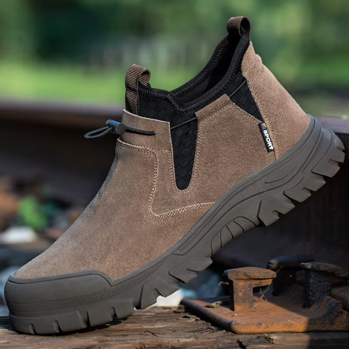 Men's brown steel-toe safety boots with non-slip sole, ideal for demanding work
