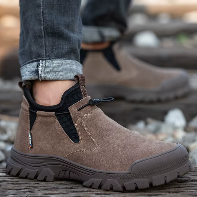 Top-down view of men's steel-toe work boots, brown suede look, comfortable slip-on design