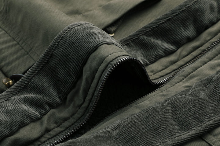 A man braving the cold in a rugged fleece-lined heavyweight work jacket.