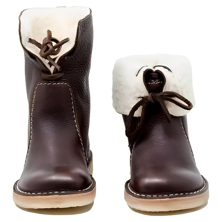 Warm, insulated men's winter boots with durable waterproof construction and lace-up design for outdoor use.