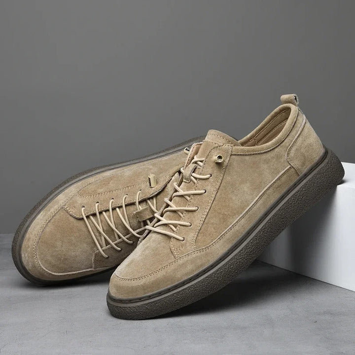 Everyday men's low-top sneakers in soft gray suede, versatile and stylish casual shoes.