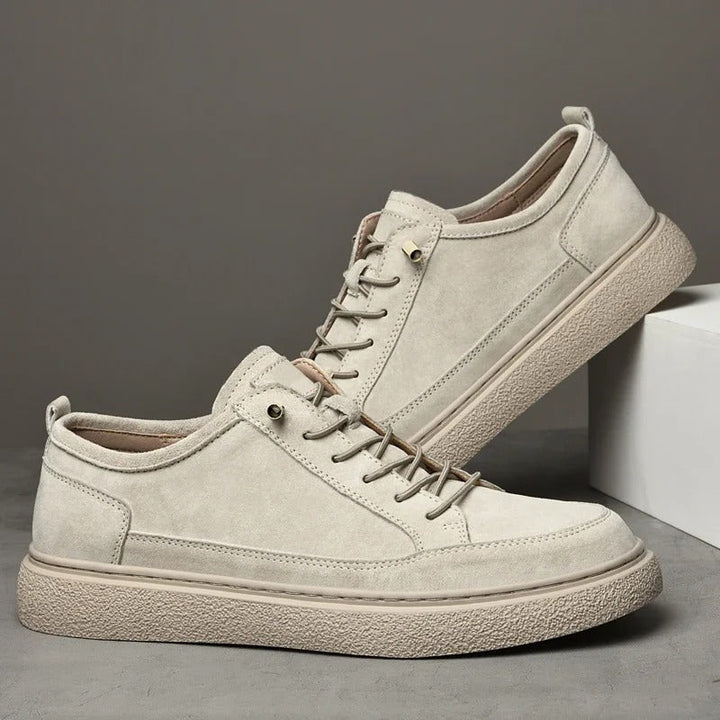 Comfortable men's beige suede shoes, low-top style suitable for everyday wear.