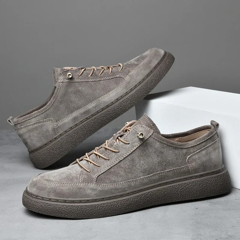 Stylish sand suede low-top sneakers for men, offering both comfort and modern casual look.