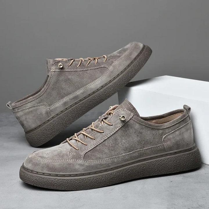 Stylish sand suede low-top sneakers for men, offering both comfort and modern casual look.
